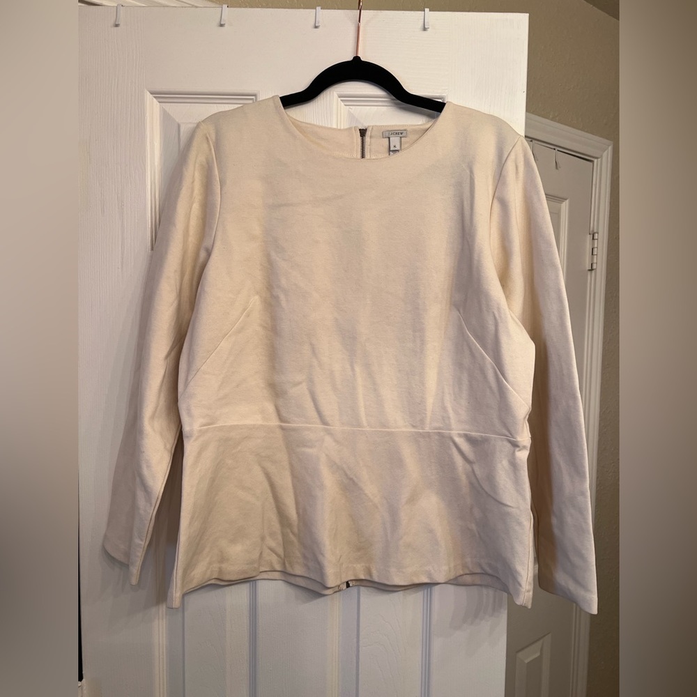 J. Crew Zip back cream peplum top